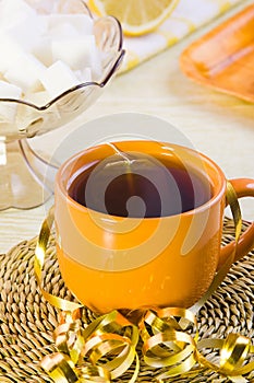 Cup of tea, lemon and sugar