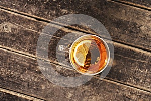 Cup of tea with lemon on table close-up