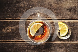 Cup of tea with lemon on table close-up