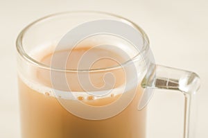 cup of tea with milk/cup of tea with milk on a white background, close up