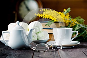 Cup of tea near old books