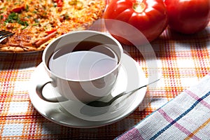Cup of tea and pizza
