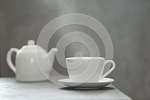 Cup of tea and saucer on table