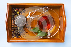 Cup of tea and a tea strainer