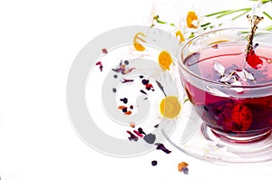 Cup of tea with teabag over white