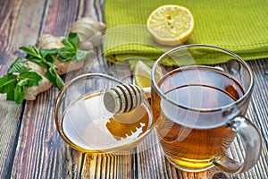 A cup of tea on a wooden table image