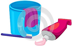 A cup, toothbrush and toothpaste