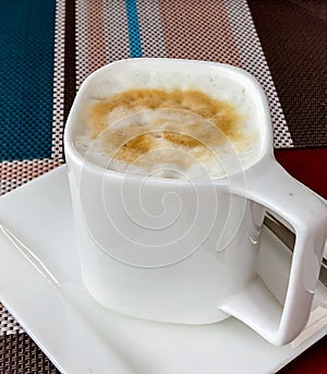 A cup of unsweetened latte,