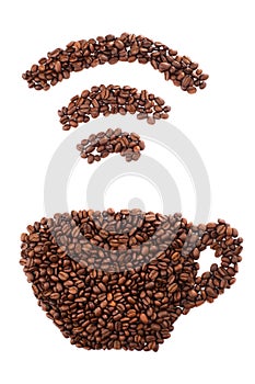 Cup with wi-fi shape made of coffee beans over white background