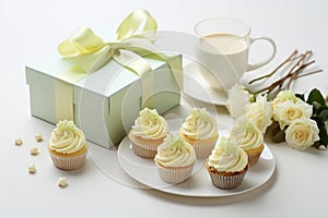 Cupcake bar decorated by flowers standing of festive table with deserts