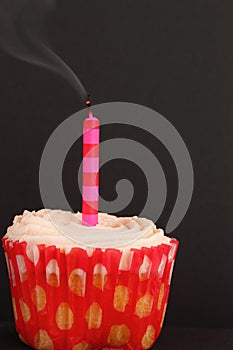 Cupcake with blown out candle