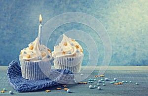 Cupcake with a blue candle