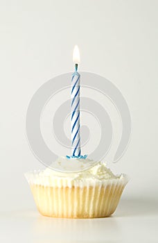 Cupcake with blue candle