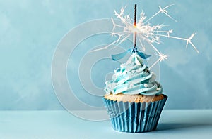 Cupcake With Blue Frosting and Sparkler