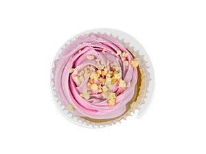 Cupcake with bright cookies isolated on a white background. The view from the top.