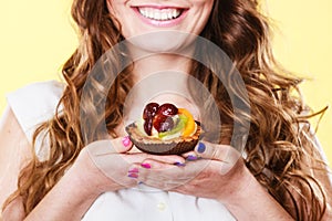 Cupcake cake in woman hand. Sweet food.