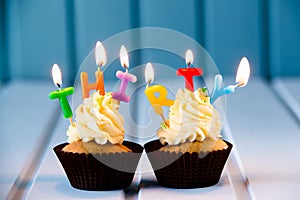 Cupcake with a candles for 30 - thirtieth birthday