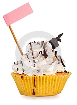 Cupcake with chocolate drizzle and pink flag