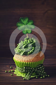 Cupcake with clover cakepick