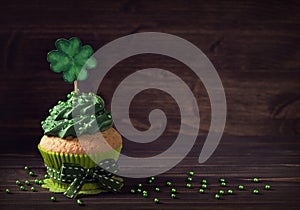 Cupcake with clover cakepick