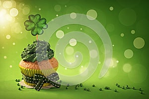 Cupcake with clover cakepick