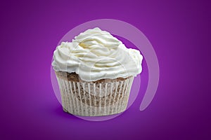 Cupcake with cream on isolated background