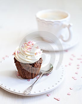 Cupcake with creamcheese icing photo