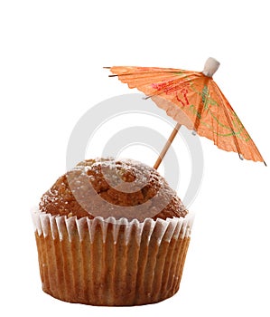 Cupcake muffin with red cocktail parasol