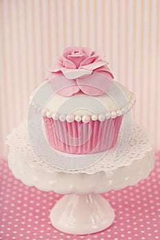 Cupcake with rose flower