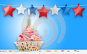 Cupcake and Stars. Happy Birthday, 4th of July, Independence, Memorial or Presidents Day. Tasty cupcakes with pink cream icing and
