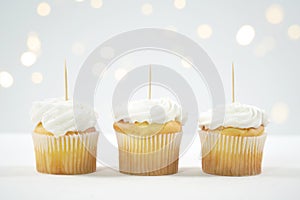 Cupcake Topper Mockup. White background with bokeh party fairy lights. photo