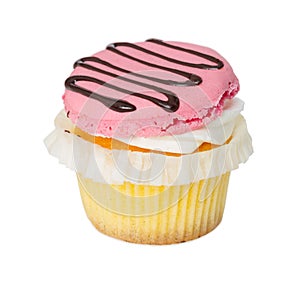 Cupcake with vanilla cream and strawberry macaroon isolated on w