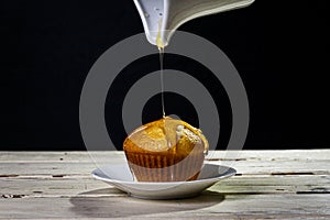 Cupcake whit syrup photo