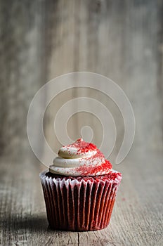 Cupcake on wood background