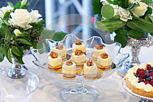 Cupcakes on banquet table. Wedding table setting