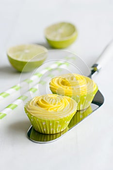Cupcakes on cake shovel and drinking straws