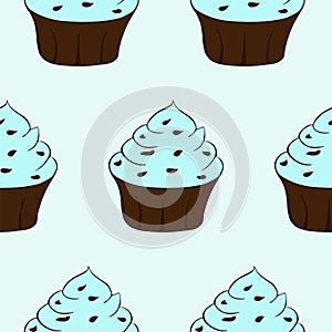 Cupcakes with chocolate sprinkles isolated. Blue background. Sweet Dessert with cream. Seamless pattern.Vector