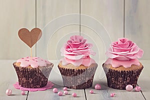 Cupcakes with heart cakepick