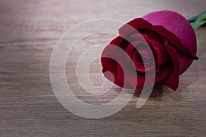 A cupcakes with heart shape chocolate on wooden table