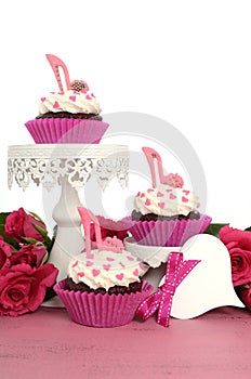 Cupcakes with high heel stiletto fondant shoes photo