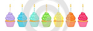 Cupcakes in rainbow colors with candles. Vector cartoon illustration