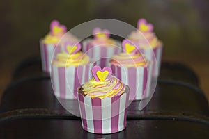 Cupcakes with swirl of frosting and hearts