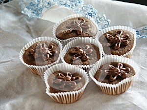 Cupcakes Topped With Chocolate Frosting Flowers