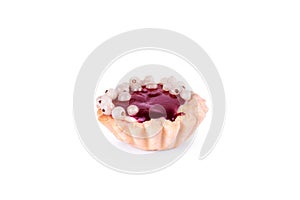 Cupcakes with white currants on a white background