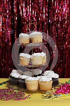 Cupcakes With White Icing on Table at Party or Event