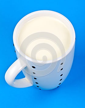 Cupful of milk photo