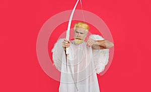 Cupid shot with bow and arrow. Happy Valentines Day. Serious man in angel wings. Amour. God of love.