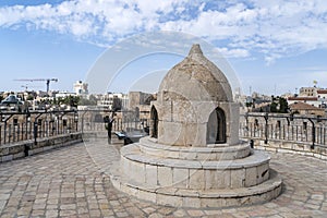 The cupola in the middle of the roof of the Church of Holy Sepulchre, admits light to St Helena s crypt and dome
