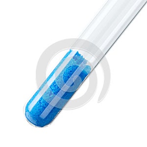 Cupric sulfate in test tube over white