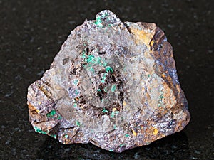 Cuprite and Malachite in Limonite mineral on dark